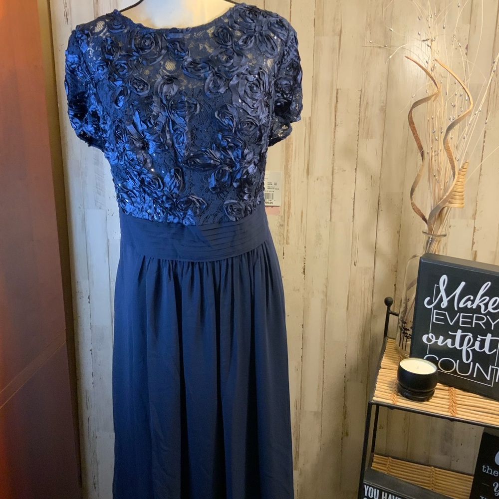 Floor length sheath plus gown with lace bodice. NWT size 18W